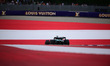 Fernando Alonso of the Aston Martin Cognizant F1 Team drives during free practice in the 1...