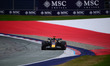 Max Verstappen of Red Bull Racing Honda drives during free practice, the 12th round of the...