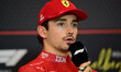 Charles Leclerc of Scuderia Ferrari speaks at a press conference after qualifying for the...