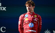 Charles Leclerc of Scuderia Ferrari celebrates after the race in Spielberg, Styria, Austri...