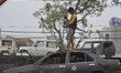 A Worker arranging crane to lift Smashed Card for dismantle using Oxygen Acetylene Gas to...