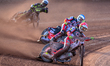 Tate Zischke of Belle Vue Aces, in red, leads Jake Mulford of Belle Vue Aces, in blue, and...