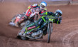 Danny King of Ipswich Witches in white leads Jake Mulford of Belle Vue Aces in blue during...