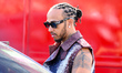Lewis Hamilton of Great Britain and Ferrari arrives during the driver arrivals for the For...