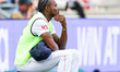 Jofra Archer of England looks pensive as he watches the action from the boundary during Da...