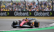 Lewis Hamilton of Scuderia Ferrari runs during free practice at the 13th round of the Form...