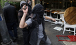 Members of the Black Anarchist Bloc carry out direct action against establishments in the...