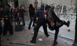 Members of the Black Anarchist Bloc carry out direct action against establishments in the...