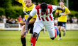 NAC Breda forward Sydney van Hooijdonk and Top Oss player Leonel Miguel participate in the...