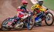 Belle Vue Aces' Brady Kurtz in red rides outside Birmingham Brummies' Matej Zagar in white...