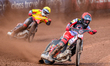 Belle Vue Aces' Zach Cook in red leads Birmingham Brummies' Sam Hagon in yellow during the...