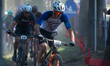 Cyclists compete in the CROSS-COUNTRY SHORT TRACK Men Elite during the UCI Mountain Bike W...