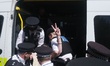 Supporters of the banned direct action protest group, Palestine Action, gather in Westmins...