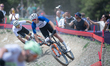 Cyclists compete in the CROSS-COUNTRY OLYMPIC for Men during the UCI Mountain Bike World C...