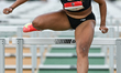 EDMONTON, CANADA - JULY 13:Tatiana Aholou of Canada, on her way to win in the women's 100...