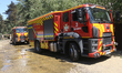 Fire engines respond to a Russian drone attack in a suburb of Dnipro, Ukraine, on July 14,...