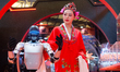 A Unitree Robot interacts with a Chinese opera actress at the Shanghai New International E...