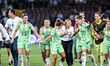 A player and staff of Italy celebrate after victory in Geneva, Switzerland, on July 16, 20...