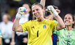 A player and staff of Italy celebrate after victory in Geneva, Switzerland, on July 16, 20...