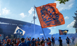 Cincinnati supporters march to the stadium before the start of the Major League Soccer mat...