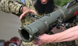 EDMONTON, CANADA - JULY 18:A Canadian Armed Forces soldier demonstrates the Carl Gustaf M...