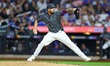 New York Mets relief pitcher Chris Devinski (49) throws during the seventh inning of a bas...