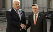 Ukrainian Foreign Minister Andrii Sybiha and Israeli Foreign Minister Gideon Saar shake ha...
