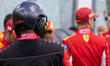 A Ferrari pit-crew marshal stands trackside before the start of the FIA World Endurance Ch...