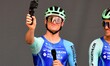 Cyclist Felix Gall with a GoPro camera from the Decathlon Ag2r la Mondiale team stands on...