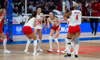 Turkey players celebrate after scoring a point during the volleyball match between Japan a...