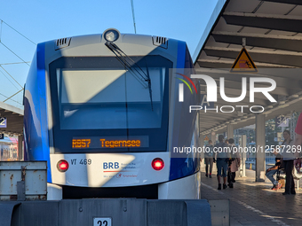 A BRB regional train on route RB57 to Tegernsee stands at the platform in the early morning at Munich Main Station in Munich, Bavaria, Germa... by Michael Nguyen/NurPhoto