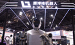 A large humanoid robot is seen at the Cyborg booth at the Shanghai New Expo Center during...