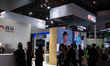 A general view shows fairgoers in front of the Sensetime booth at the Shanghai New Expo Ce...