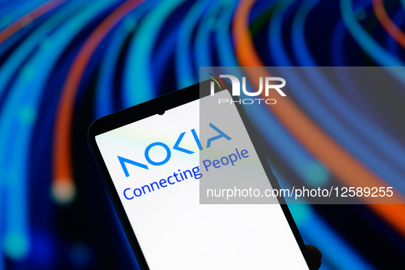 The Nokia logo is displayed on a mobile phone in this photo illustration in Brussels, Belgium, on July 26, 2025. 