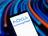 The Nokia logo is displayed on a mobile phone in this photo illustration in Brussels, Belgium, on July 26, 2025. 