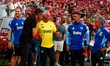 Jose Mourinho, head coach of Fenerbahce, stands with Bruno Lage, head of SL Benfica, durin...
