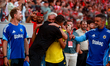 Jose Mourinho, head coach of Fenerbahce, stands with Bruno Lage, head of SL Benfica, durin...