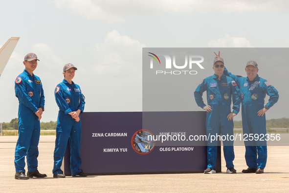 Crew 11 poses for the media after their arrival at the Kennedy Space Center. From left to right: JAXA Astronaut Kimiya Yui, NASA Astronaut Z...