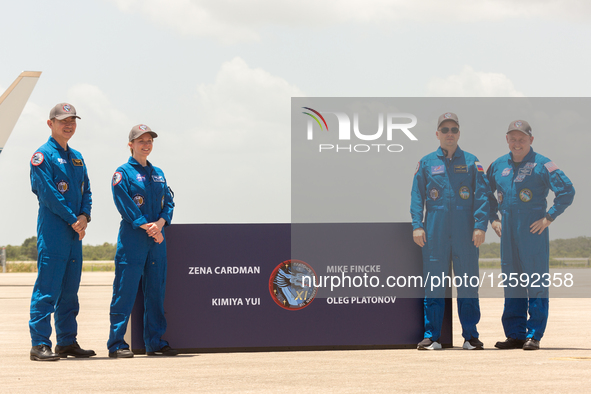Crew 11 poses for the media after their arrival at the Kennedy Space Center. From left to right: JAXA Astronaut Kimiya Yui, NASA Astronaut Z...