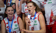 Agnieszka Korneluk and Martyna Czyrnianska celebrate after Poland defeats Japan in the 3rd...