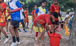 Girls drink water during practice at a women's football academy in Nandail, Mymensingh, Ba...