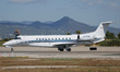 A Vistajet Embraer Legacy 650E is on the runway for takeoff from Barcelona-El Prat Airport...