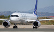 An SAS Airbus A320-251N is on the runway for takeoff from Barcelona-El Prat Airport in Bar...