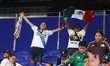 Club Puebla fans celebrate the team's 3-0 win in the League Cup Series soccer match agains...