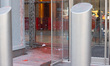 Red paint streaks down the facade and stains the sidewalk in front of The New York Times B...