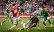 AZ Alkmaar midfielder Sven Mijnans and Ilves Tampere goalkeeper Otso Virtanen play during...