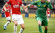 AZ Alkmaar midfielder Sven Mijnans and Ilves Tampere defender Sauli Vaisanen play during t...