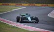 Fernando Alonso of the Aston Martin Cognizant F1 Team runs during the qualifying of the Hu...