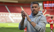 Rob Edwards, the Middlesbrough Manager, applauds the fans at the final whistle during the...