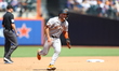San Francisco Giants player Casey Schmitt (10) advances from first to third during the fou...